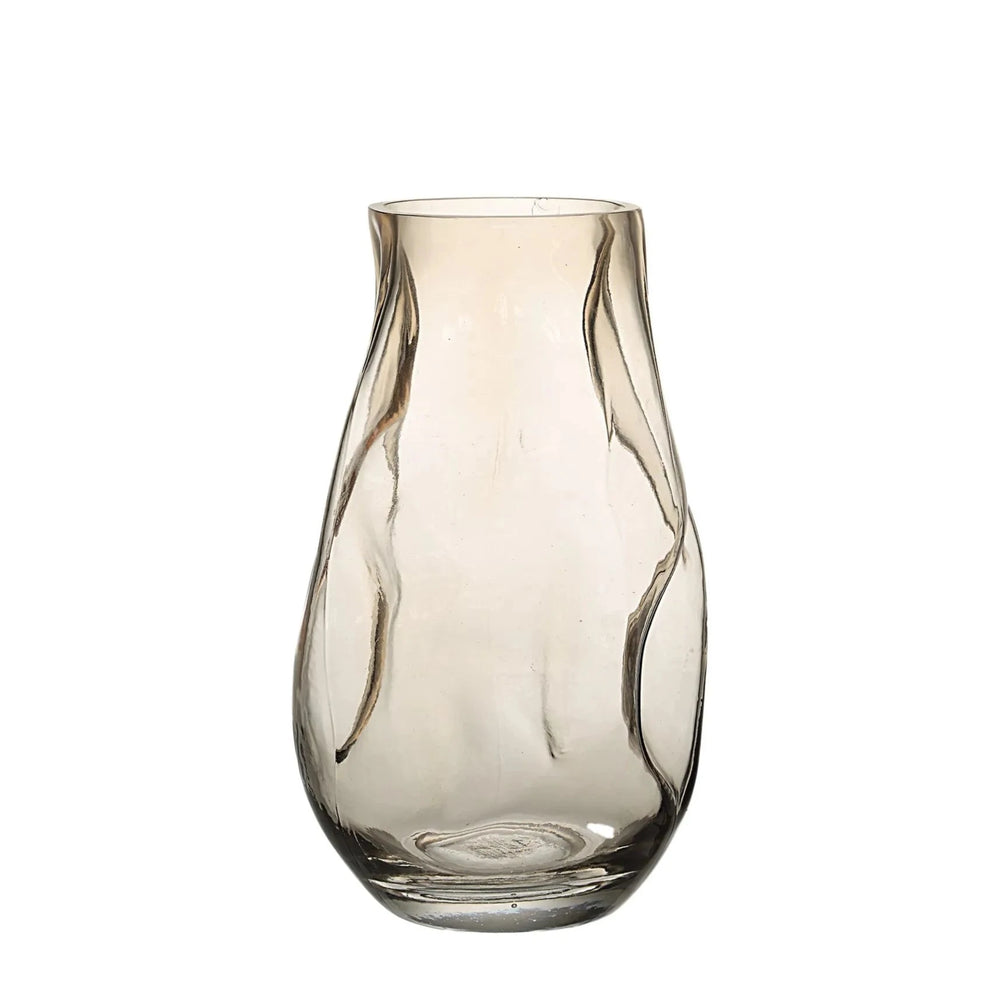A beige tinted finish glass vase with a tapered design.