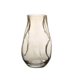A beige tinted finish glass vase with a tapered design.