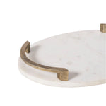Round marble tray with brass handle on a white background