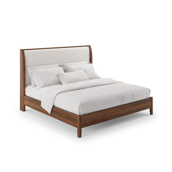 A queen-sized bed frame with a beige upholstered headboard and a wooden frame, presented in a clean, well-lit setting with white bedding.