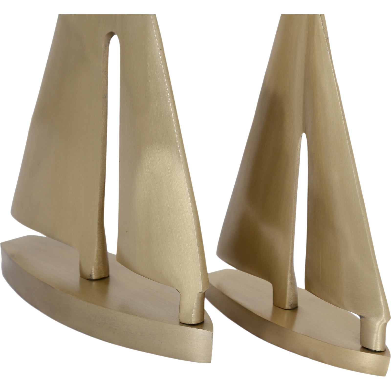 Gold plated brass sailboat decorative object with a sleek finish, depicting a two-masted sailboat in a three-quarter view.