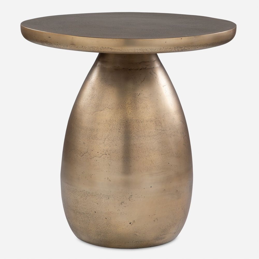 Bronze side table with a round top on a white background