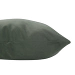 Green pillow on a white background