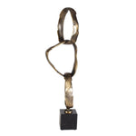 Abstract bronze sculpture on a white background