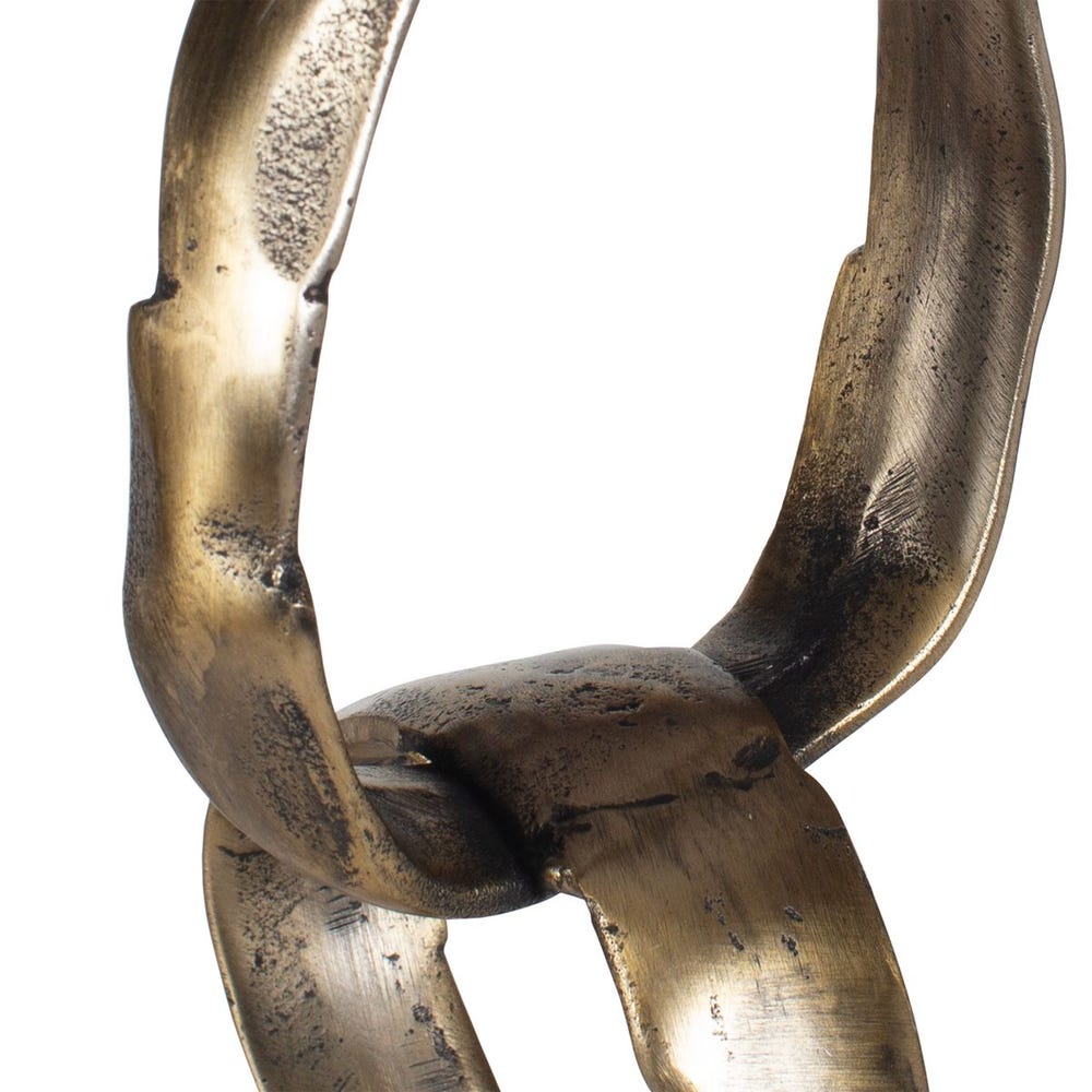 Close-up of a bronze chain link on a white background