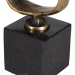 Bronze sculpture on a black marble base