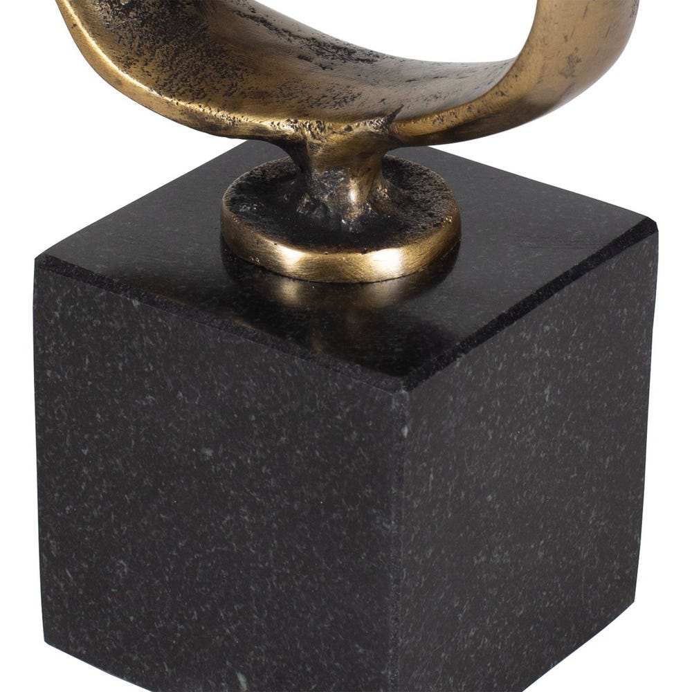 Bronze sculpture on a black marble base