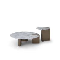 Two round marble tables with bronze legs on a white background