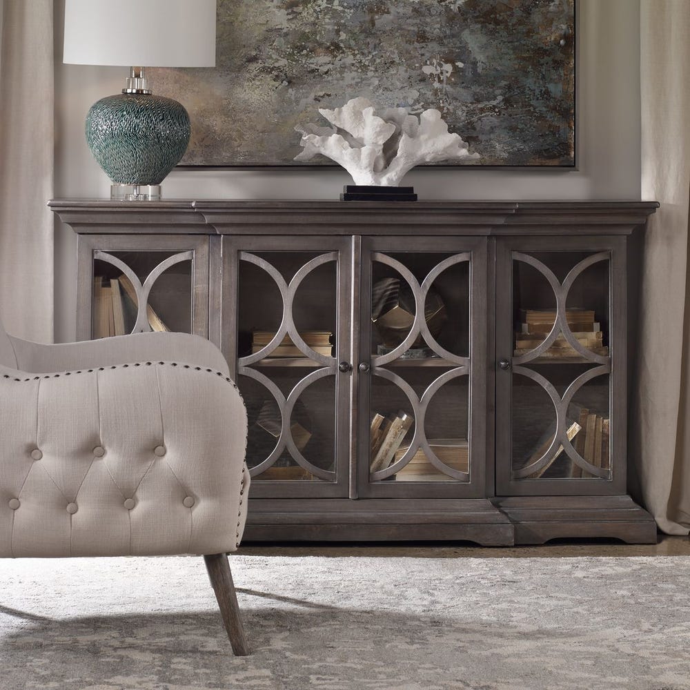 Gray sideboard with decorative elements in a room setting