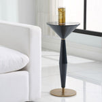 Modern side table with a glass on top in a living room setting