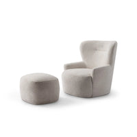 Gray upholstered chair and ottoman on a white background