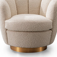 Beige textured armchair with a gold metal base on a white background