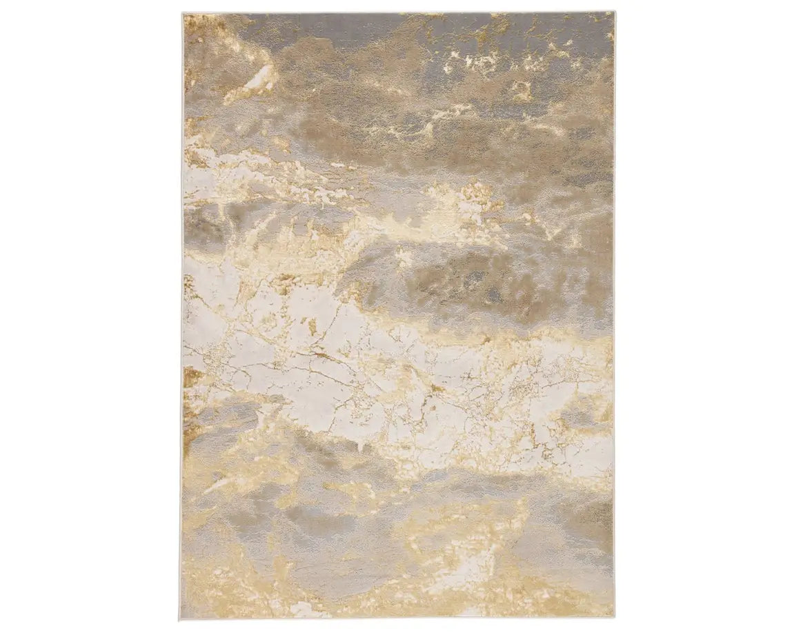 A power loomed area rug with a gold color pattern