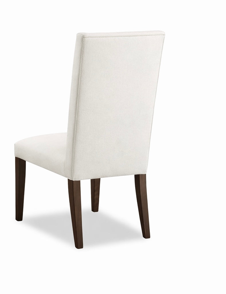 White chair with dark wooden legs on a white background
