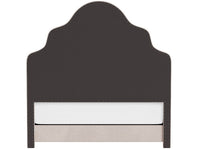 Dark gray upholstered headboard with white trim on a white background