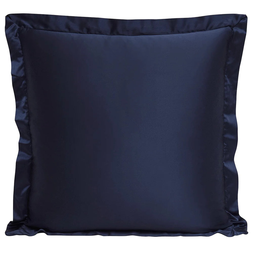 Navy blue satin pillow on a white background