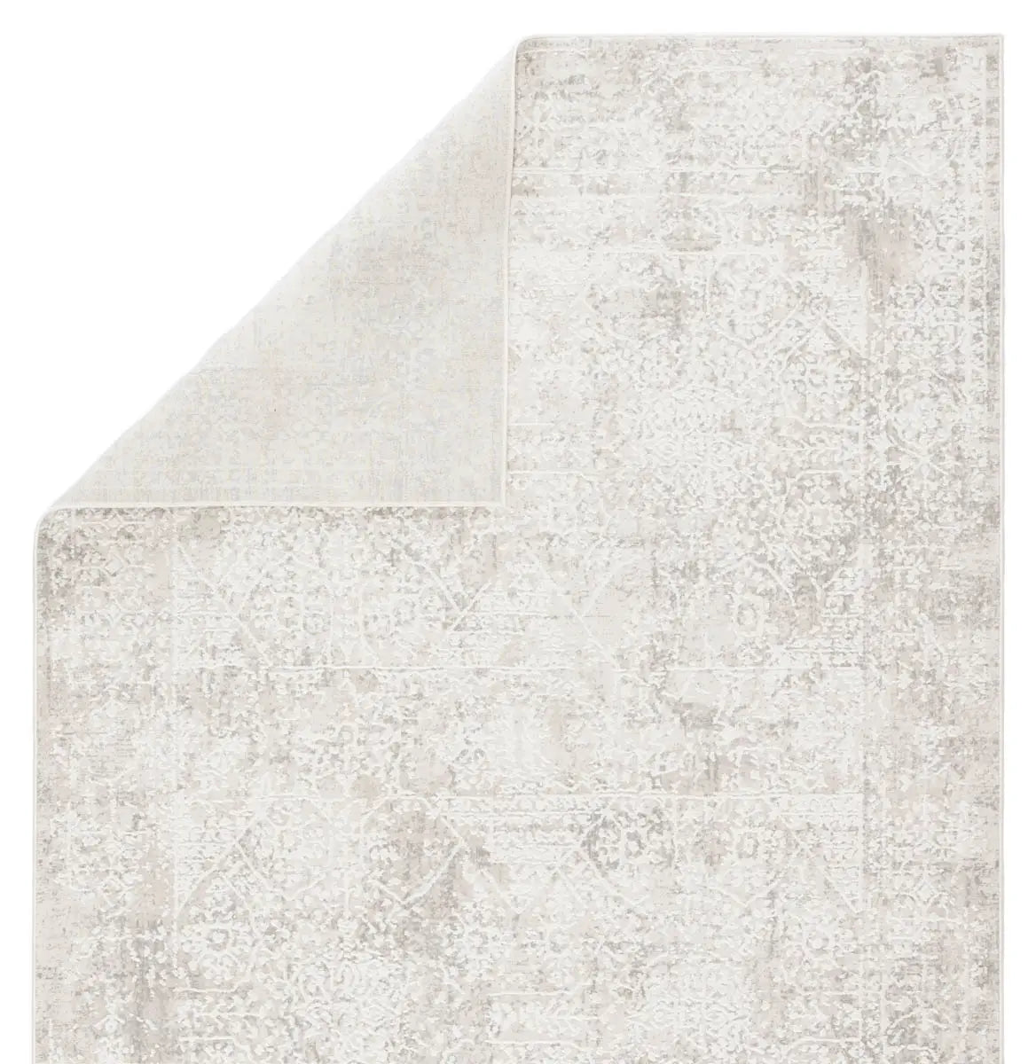 Textured rug with a subtle pattern on a white background