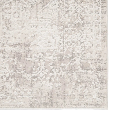 Textured area rug with a neutral color palette on a white background