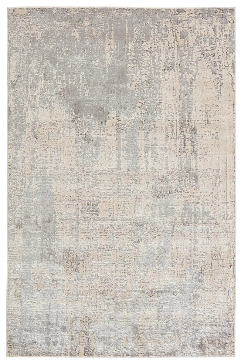 Textured area rug with a neutral color palette on a white background