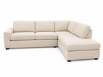 Beige sectional sofa on a white background