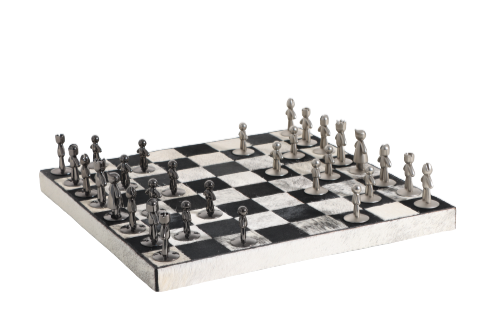 A chess set with black and white leather board pieces displayed on a chessboard.