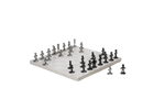 A beige marble chess board set with white and black pieces arranged on the board.