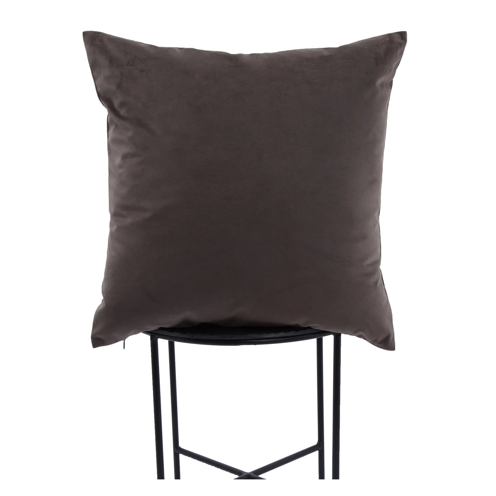 Dark brown pillow on a black stool against a white background