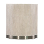 Textured beige lampshade with metallic base on a white background