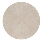 Round beige rug with a textured surface on a white background