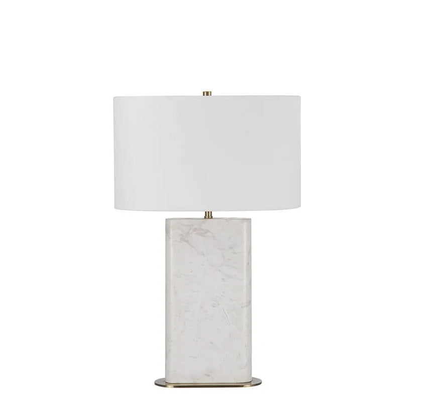 A white marble table lamp base with a natural honed finish, featuring a classic E26 socket, a dimmer switch, and an off-white linen shade, complemented by a brushed brass finished iron stem.