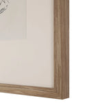 Close-up of a wooden picture frame corner on a white background