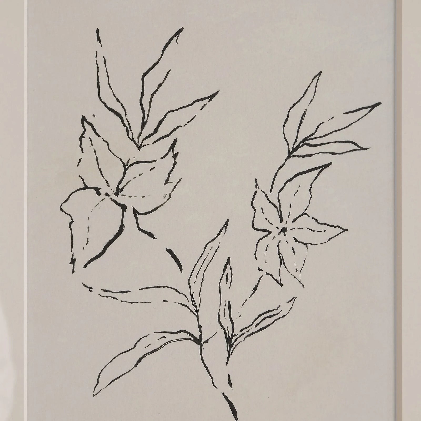 Black line drawing of flowers on a beige background