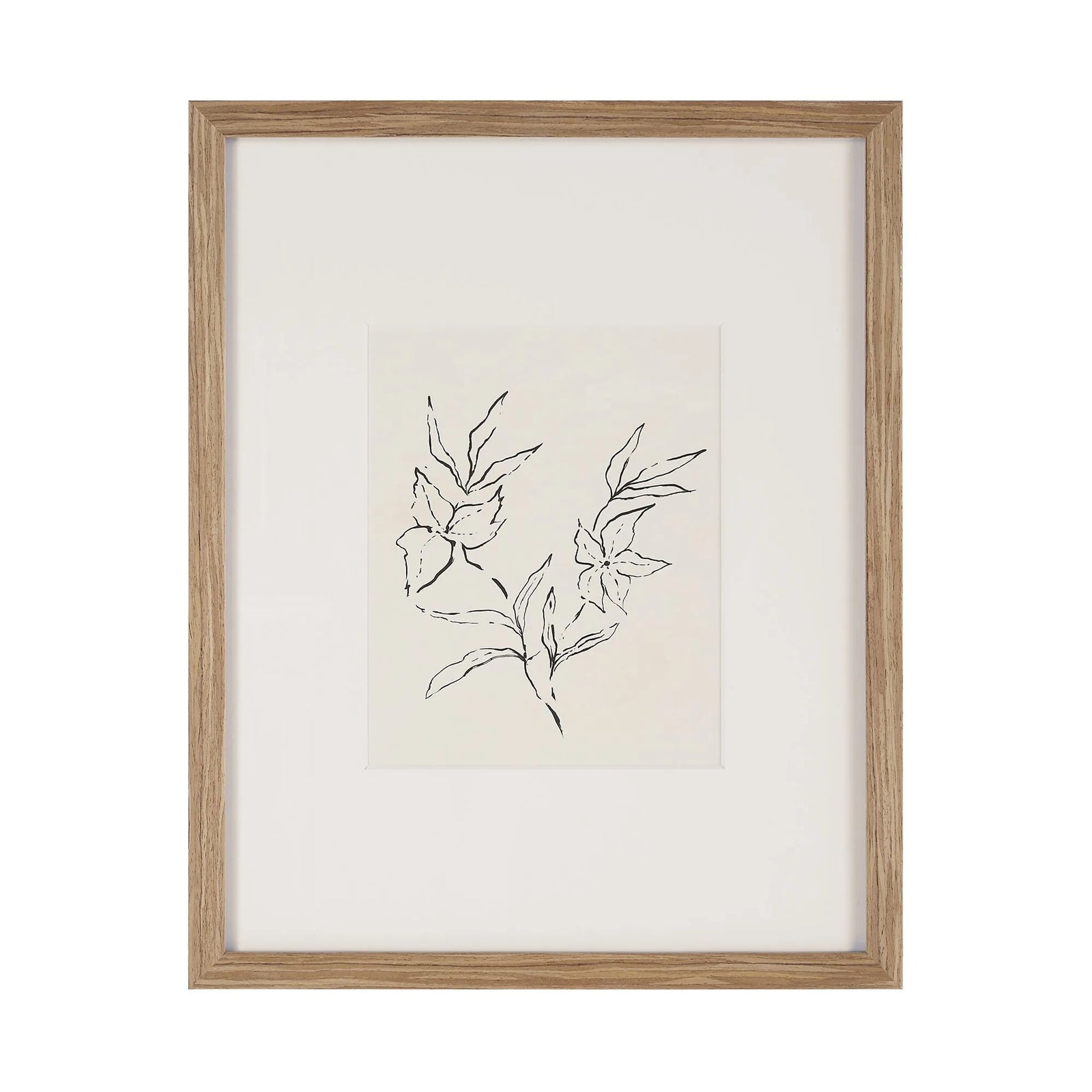 Framed artwork with black line drawing of leaves on a white background