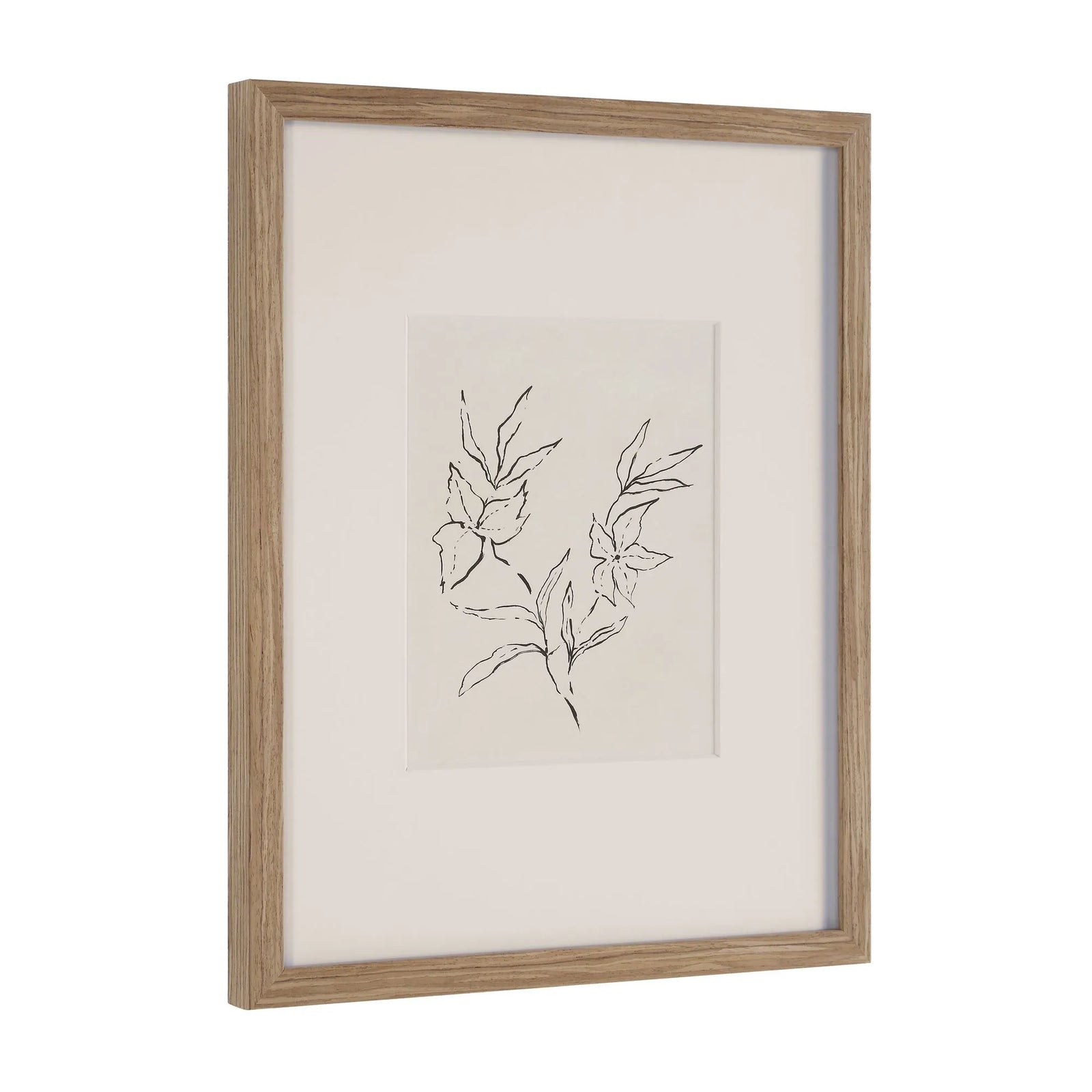 Framed artwork with a minimalist black line drawing of leaves on a white background