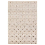 Beige area rug with a subtle pattern on a white background