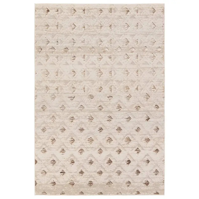 Beige area rug with a subtle pattern on a white background