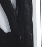 This image features a striking piece of classical wall art, measuring 24 x 2 x 36 inches. The artwork presents a bold black and white abstract design, with intricate lines and shapes that evoke a sense of movement and complexity.