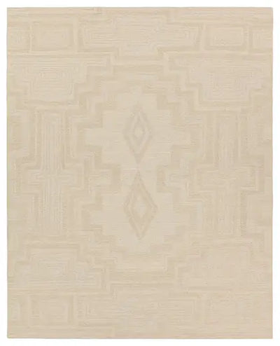 Beige area rug with geometric pattern on a plain background
