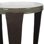 Round table with a white marble top and dark wooden legs on a white background