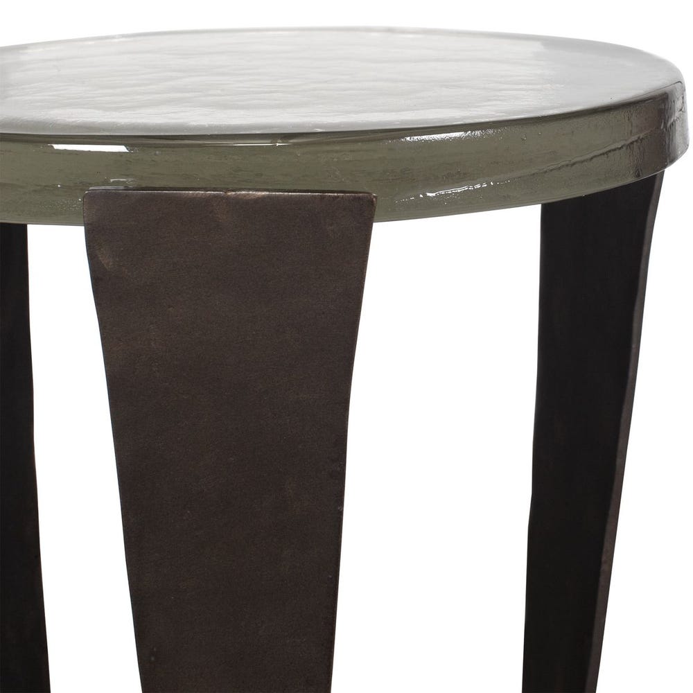 Round table with a white marble top and dark wooden legs on a white background