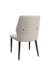 Beige chair with quilted backrest on a white background