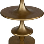 Bronze-colored metal table with a textured finish on a white background