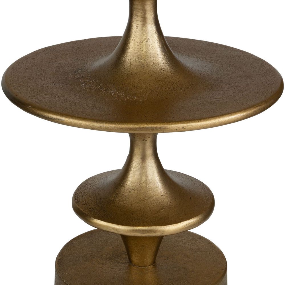 Bronze-colored metal table with a textured finish on a white background