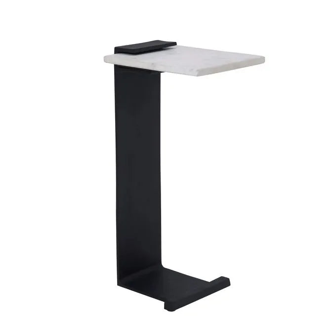 An end table with a black matte finish leg and a natural white marble top.