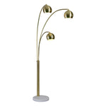A modern industrial style metal floor lamp with a gold finish, featuring a central stem and multiple curved branches with spherical lamp shades.