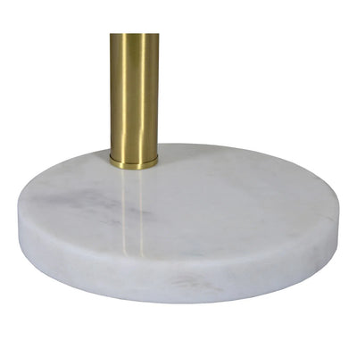 Close-up of a modern industrial style metal floor lamp with a gold finish, featuring a central stem and multiple curved branches with spherical lamp shades.