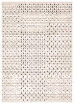 Textured beige rug with subtle pattern on a plain background