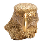 A decorative eagle-shaped object with a metallic gold finish.