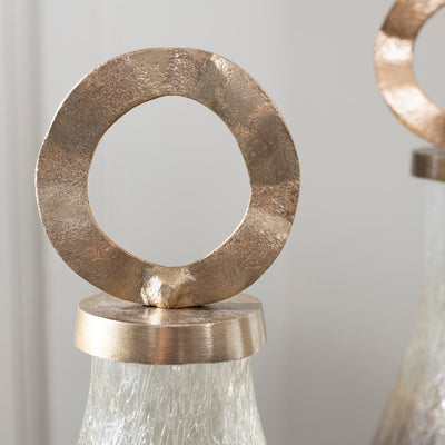 close-up to decorative vases with metallic finishes on a white background