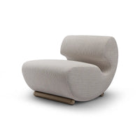 Modern beige armchair on a white background